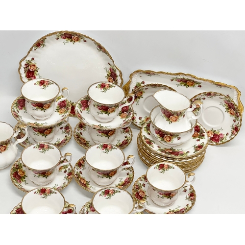 307 - A 41 piece Royal Albert ‘Old Country Roses’ tea service. 10 cups, 12 saucers, 2 milk jugs, sugar bow... 