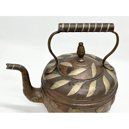 290 - A Late 19th Century Indian copper kettle with brass foliage. 25x17x23cm