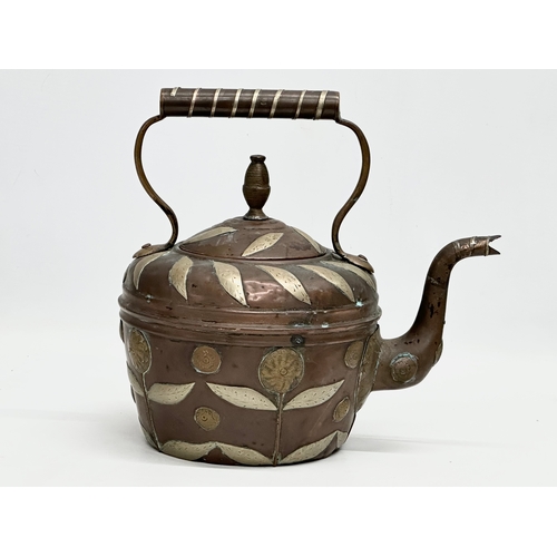 290 - A Late 19th Century Indian copper kettle with brass foliage. 25x17x23cm