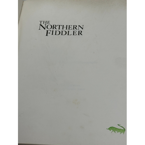 332 - The Northern Fiddler. Music and Musicians of Donegal and Tyrone. By Allen Feldman & Eamonn O’Doherty... 