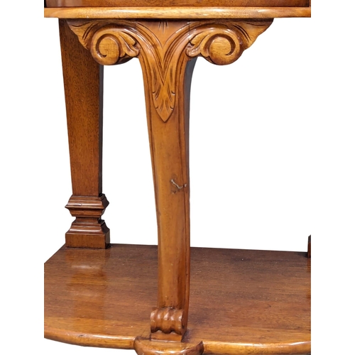 1045 - A mahogany bedside cabinet. 52.5x47x58cm