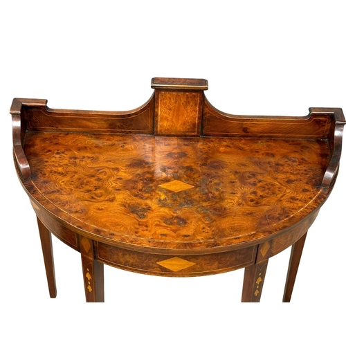 806 - A Sheraton style inlaid burr elm side table with gallery back. 93x50x91cm