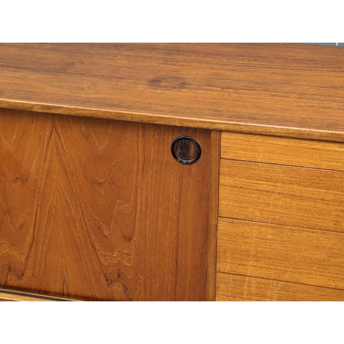 808 - A Mid Century teak sideboard by Wrighton. 1950s/1960s. 184x46x75