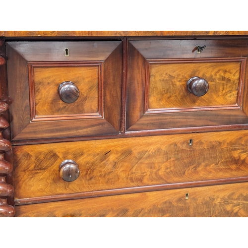 817 - A large Victorian mahogany Scotch chest of drawers with Barley Twist columns. 129x66x133.5cm