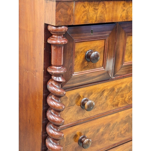 817 - A large Victorian mahogany Scotch chest of drawers with Barley Twist columns. 129x66x133.5cm