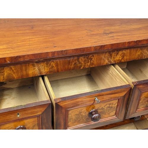 817 - A large Victorian mahogany Scotch chest of drawers with Barley Twist columns. 129x66x133.5cm