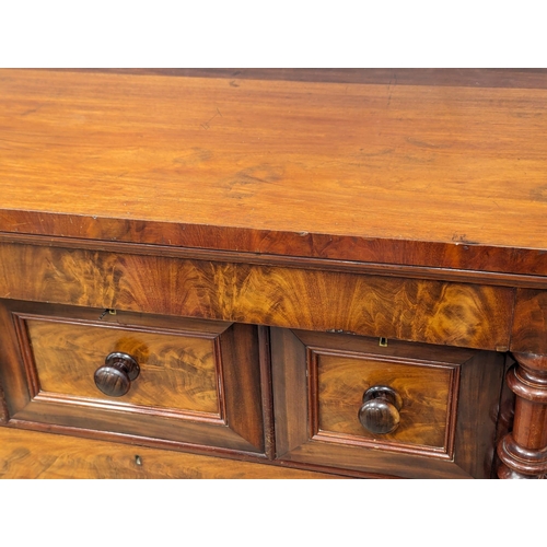 817 - A large Victorian mahogany Scotch chest of drawers with Barley Twist columns. 129x66x133.5cm