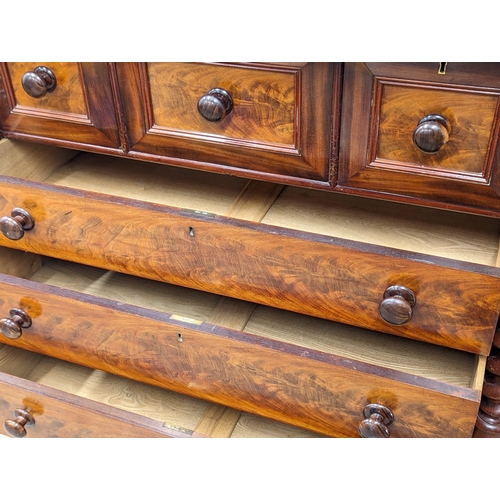 817 - A large Victorian mahogany Scotch chest of drawers with Barley Twist columns. 129x66x133.5cm