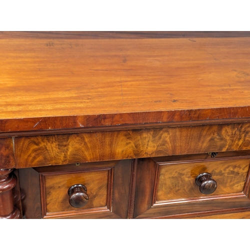 817 - A large Victorian mahogany Scotch chest of drawers with Barley Twist columns. 129x66x133.5cm