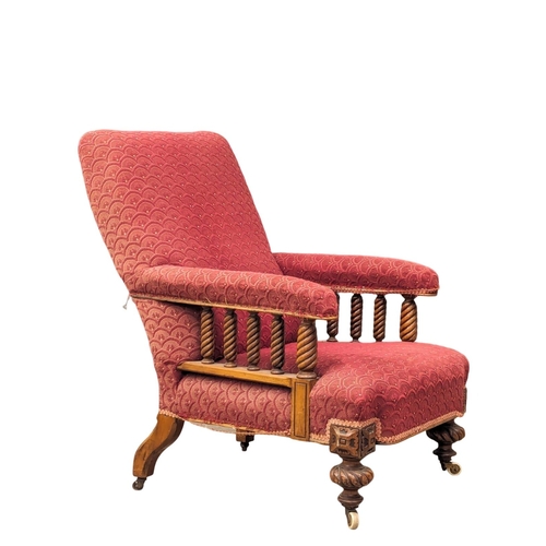 841 - A large William IV mahogany framed gents armchair with reeded supports and legs. 69x90x98cm