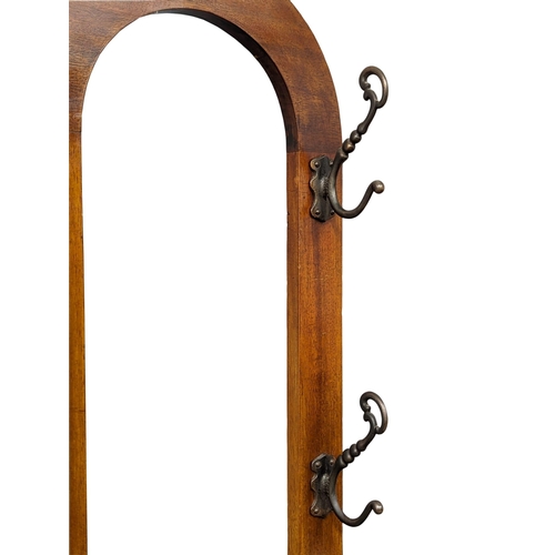 842 - A Victorian mahogany hall stand on Ball & Claw feet. 90x48x204cm