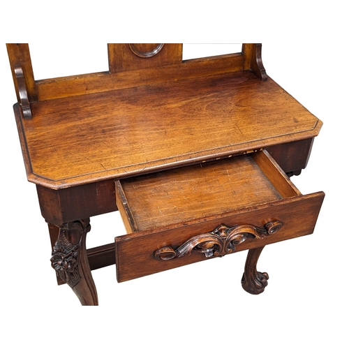 842 - A Victorian mahogany hall stand on Ball & Claw feet. 90x48x204cm