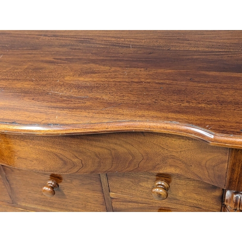 843 - A large Victorian mahogany Scotch chest of drawers. 125x52x136cm