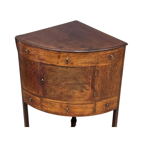 875 - A George III inlaid mahogany corner washstand. Circa 1800. 64x46x86.5cm