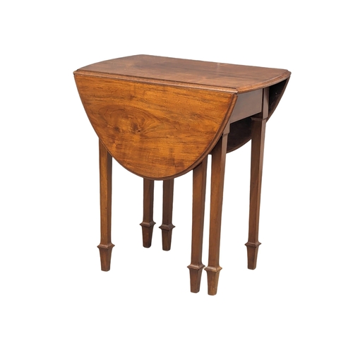 877 - An Early 20th Century walnut drop leaf table. 70x48x80cm