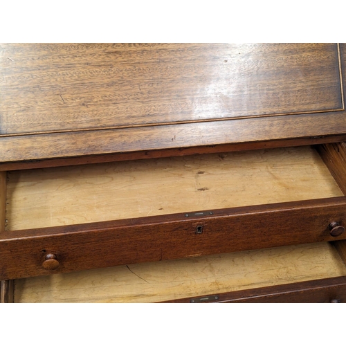 887 - An Early 20th Century on mahogany Chippendale style bureau bookcase on Cabriole legs and Ball & Claw... 