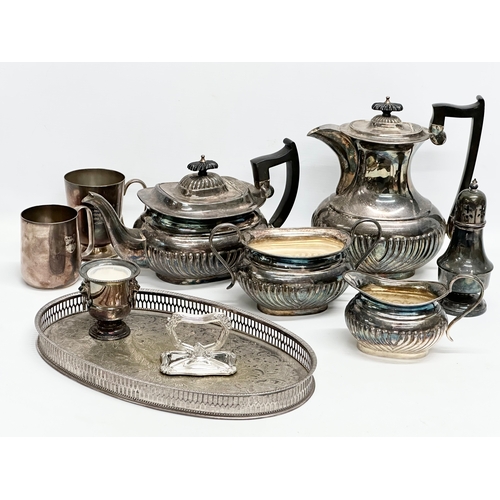 580 - A quantity of Late 19th/Early 20th Century silver plate. 4 piece Georgian style tea service, tray et... 