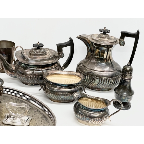 580 - A quantity of Late 19th/Early 20th Century silver plate. 4 piece Georgian style tea service, tray et... 