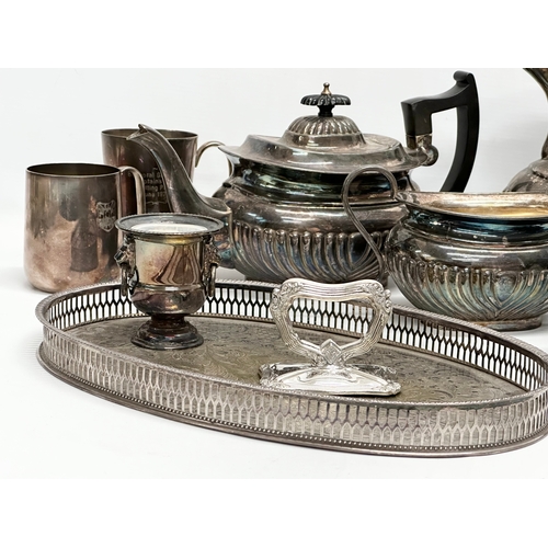 580 - A quantity of Late 19th/Early 20th Century silver plate. 4 piece Georgian style tea service, tray et... 