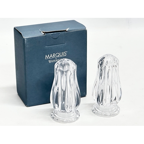 583 - A pair of Waterford Marquis salt and pepper shakers with box. 10.5cm