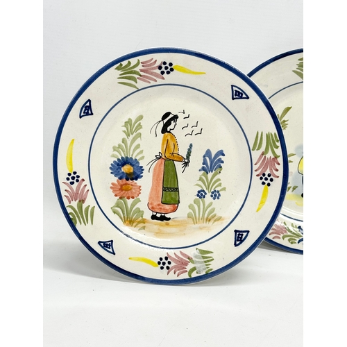 590 - A set of 4 Late 19th/Early 20th Century French earthenware plates. Probably Quimper. 22cm