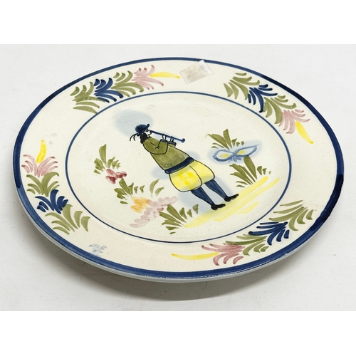 590 - A set of 4 Late 19th/Early 20th Century French earthenware plates. Probably Quimper. 22cm