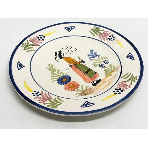 590 - A set of 4 Late 19th/Early 20th Century French earthenware plates. Probably Quimper. 22cm