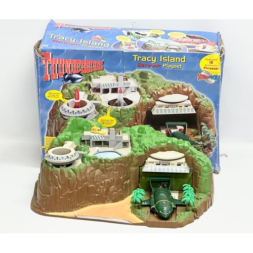 435 - A Carlton Thunderbirds Tracy Island electronic playset with box.