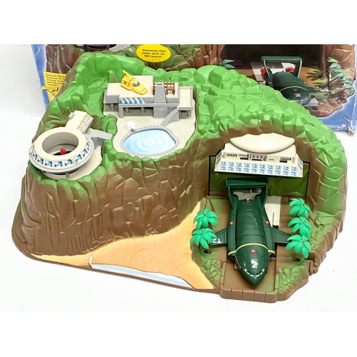 435 - A Carlton Thunderbirds Tracy Island electronic playset with box.