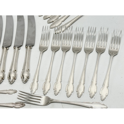 591 - A collection of silver plated cutlery.