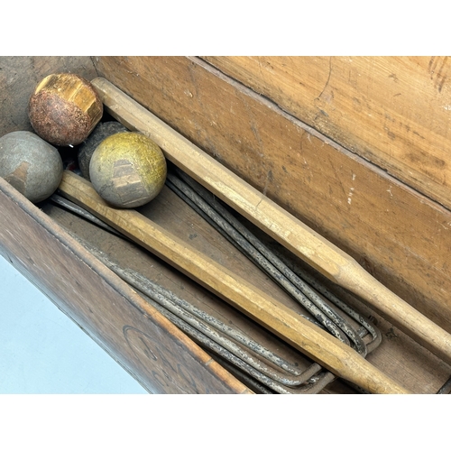 297 - An Early 20th Century Jaques of London croquet set in original box.