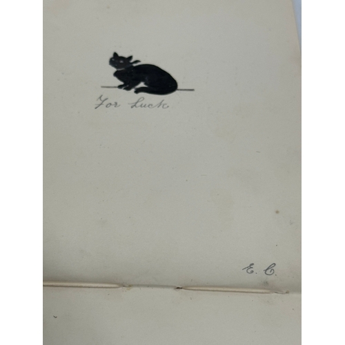 596 - An Early 20th Century album of sketches and poems with various signatures.