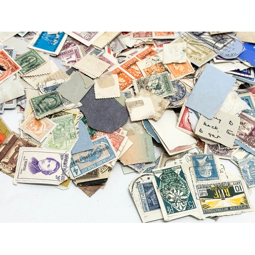 597 - A large collection of stamps. British, Canadian, Italian, India etc