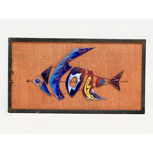 298 - A Mid Century wall plaque with enamelled fish. 48.5x26.5cm