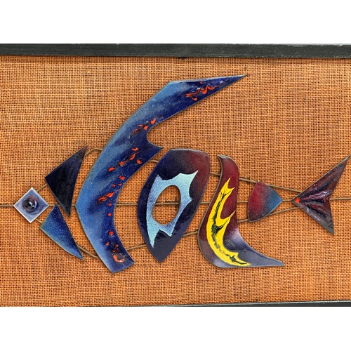 298 - A Mid Century wall plaque with enamelled fish. 48.5x26.5cm