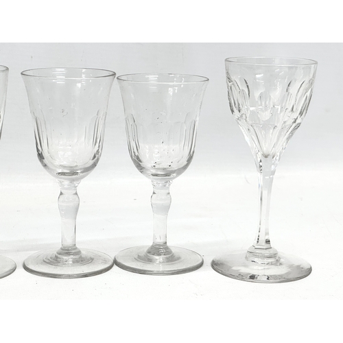 375 - A collection of Mid/Late 19th Century Victorian slice lens cut drinking glasses. 13cm. 12cm. 11cm. 8... 