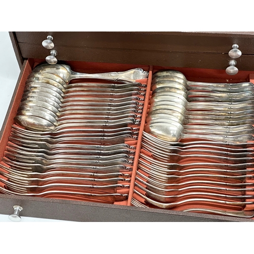 573 - A large set of silver plated cutlery in chest by Berger. 44x32x15cm