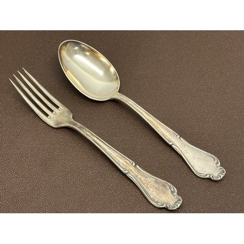 573 - A large set of silver plated cutlery in chest by Berger. 44x32x15cm