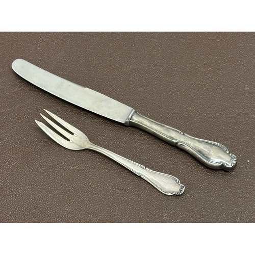 573 - A large set of silver plated cutlery in chest by Berger. 44x32x15cm