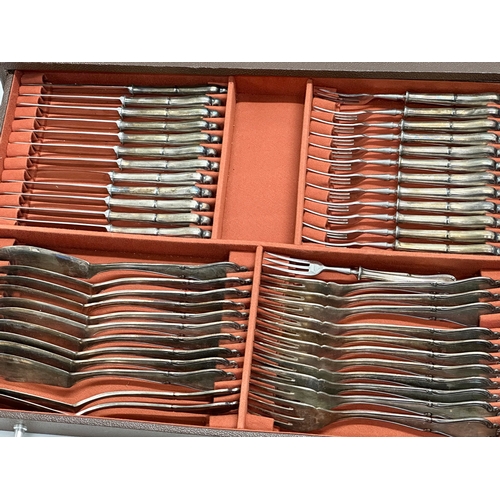 573 - A large set of silver plated cutlery in chest by Berger. 44x32x15cm