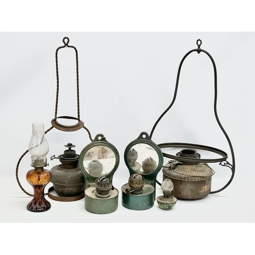 379 - A quantity of 19th and Early 20th Century oil lamps.