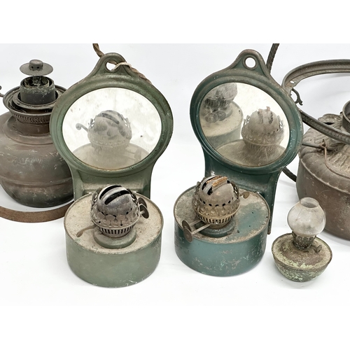 379 - A quantity of 19th and Early 20th Century oil lamps.