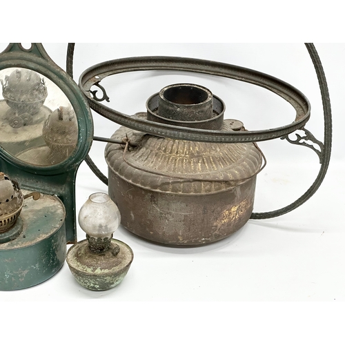 379 - A quantity of 19th and Early 20th Century oil lamps.