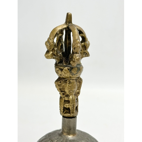 391 - 2 Late 19th Century brass and pewter bells. 16cm