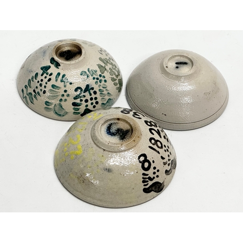 344 - A set of 3 unusual sea creature polychrome glazed stoneware bowls. Numbered 1,2,3. 11x4cm