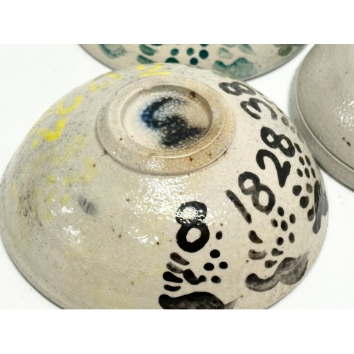 344 - A set of 3 unusual sea creature polychrome glazed stoneware bowls. Numbered 1,2,3. 11x4cm