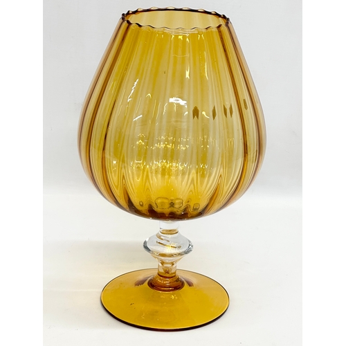 604 - 2 pieces of amber glass. A large Italian Empoli brandy glass vase and other.