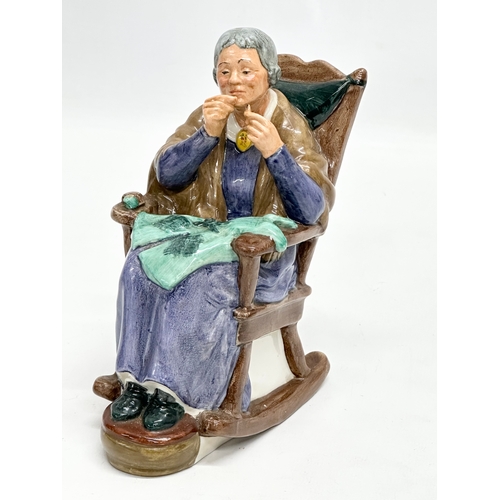 610 - 2 Royal Doulton figurines. Royal Doulton ‘A Stitch in Time’ Royal Doulton ‘Nanny’