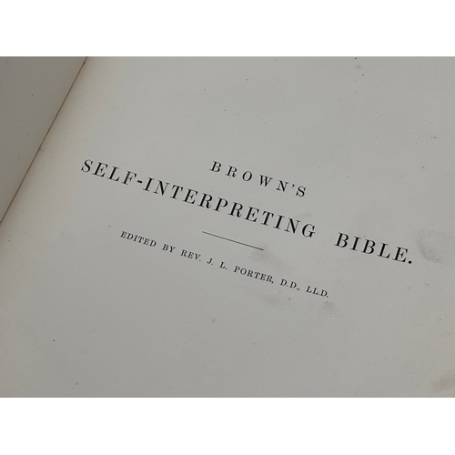 384 - A Late 19th Century Brown’s Bible. With numerous notes by the Rev Henry Cooke.