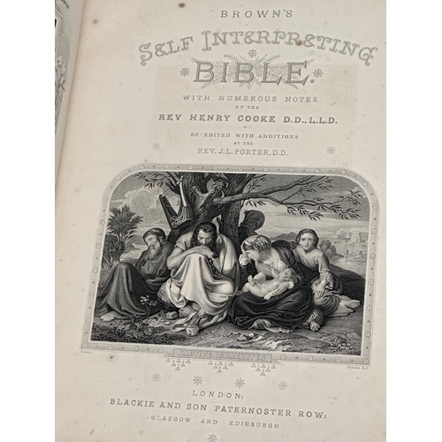 384 - A Late 19th Century Brown’s Bible. With numerous notes by the Rev Henry Cooke.